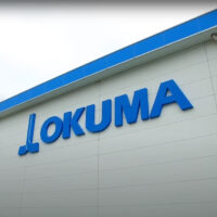Okuma logo on building 714x714